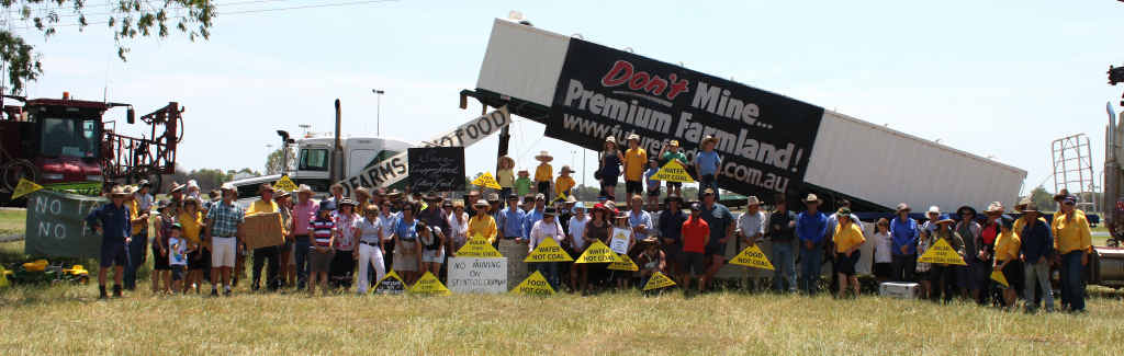 OUT IN FORCE: More than 80 landholders protest in front of government buildings in Emerald on Monday. Their simple message ‘We’ve heard enough’ was displayed on a large banner that attracted the beeps of passing motorists. Photos: Simon Green. OUT IN FORCE: More than 80 landholders protest in front of government buildings in Emerald on Monday. Their simple message ‘We’ve heard enough’ was displayed on a large banner that attracted the beeps of passing motorists. Photos: Simon Green.